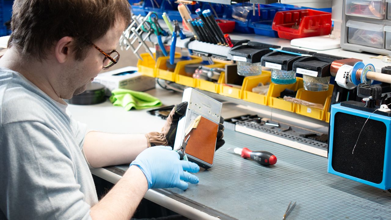 Tear down of the Polaroid SX-70 camera in the Retrospekt workshop during a refurbish
