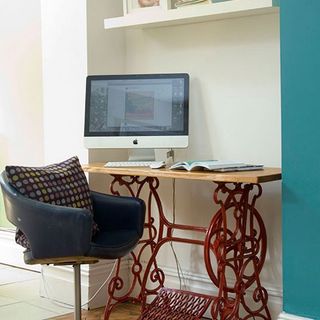 chair and table with desktop computer