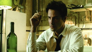 Keanu Reeves as John Constantine in 2005 film with a drink and cigarette