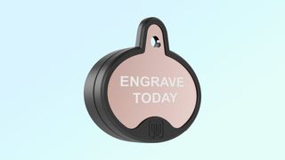 yip smart tag with rose gold cover on blue background