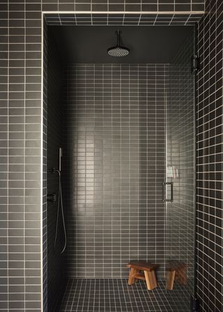 grey-tiled shower space