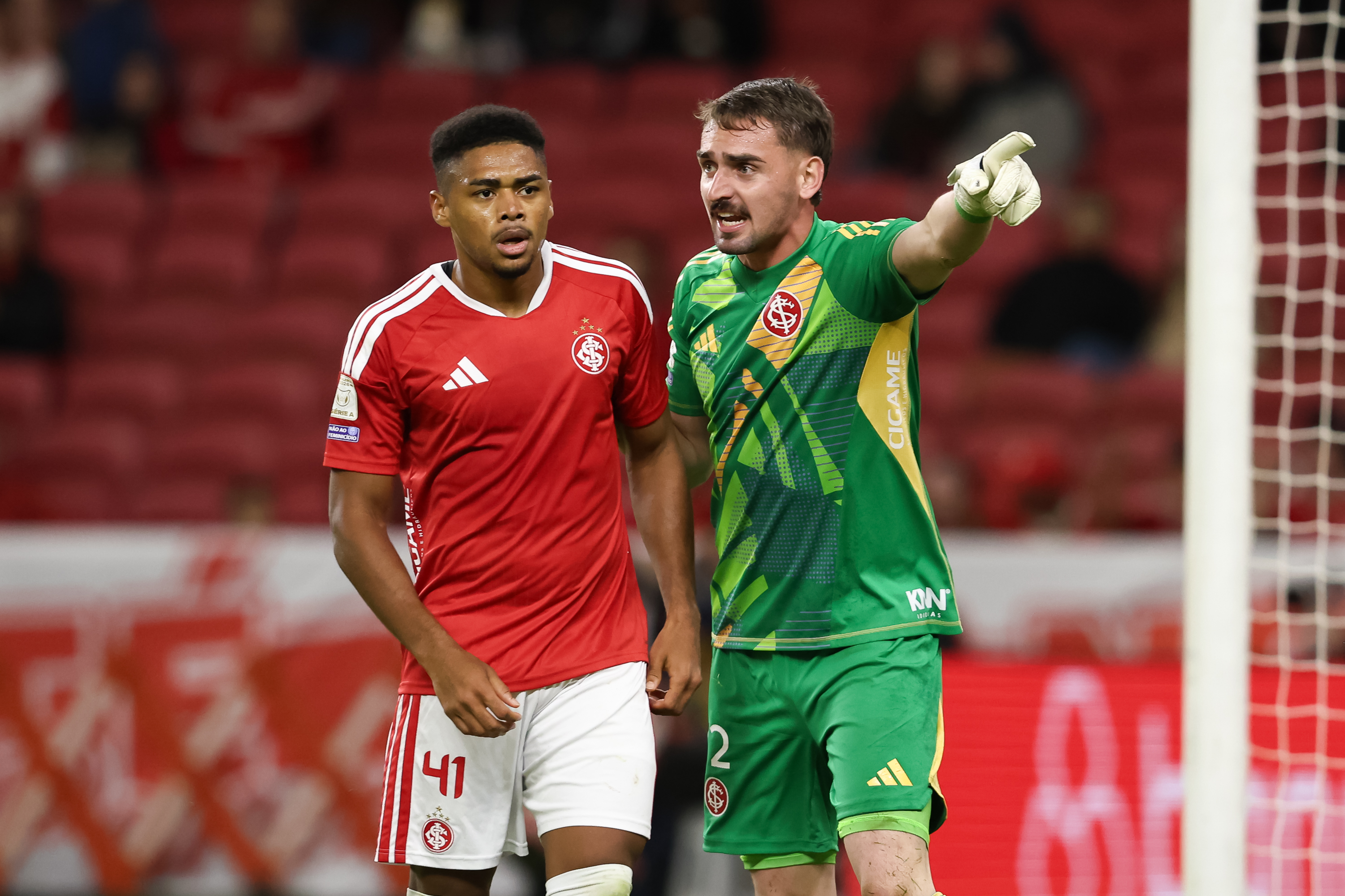 PORTO ALEGRE, BRAZIL - MAY 3: Goalkeeper Anthoni Souza talks with Victor Gabriel of Internacional during the match between Internacional and Fluminense as part of Brasileirao 2026 at Beira-Rio Stadium on May 3, 2026 in Porto Alegre, Brazil. (Photo by Pedro H. Tesch/Getty Images)