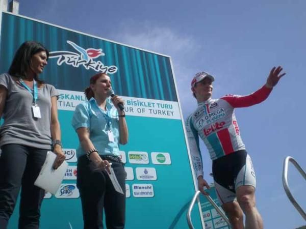 Andre Greipel (Omega Pharma-Lotto) climbs onto the podium.