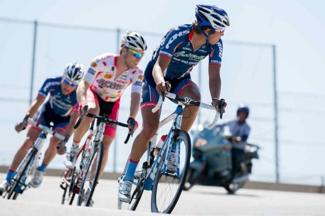 Cole House, overall leader for the first two stages, checks the gap following an attack on the final climb of the circuit early in stage four of the Sea Otter Classic.