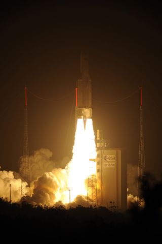 An Ariane 5 rocket carrying the European Space Agency's ATV-3 cargo ship Edoardo Amaldi lights up the night just after a dazzling liftoff just after 12 a.m. EDT from Guiana Space Center in Kourou, French Guiana.