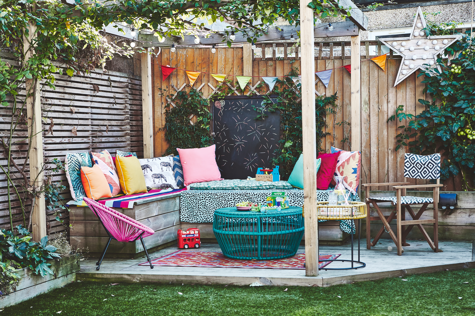 Pergola ideas with colorful cushions and corner sofa