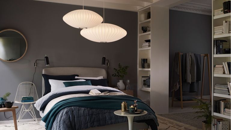 bedroom with dark and moody scheme and bright lighting by john lewis an partners