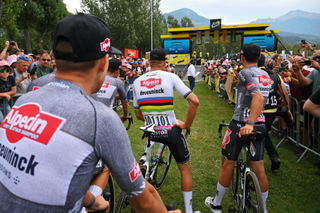 EMBRUN, FRANCE - JULY 19: (L-R) Mathieu van der Poel of Netherlands and Jasper Philipsen of Belgium and Team Alpecin - Deceuninck prior to the 111th Tour de France 2024, Stage 19 a 144.6km stage from Embrun to Isola 2000 - (2022m) / #UCIWT / on July 19, 2024 in Embrun, France. (Photo by Tim de Waele/Getty Images)