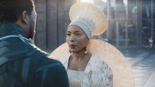 Angela Bassett faces Chadwick Boseman in a royal dress in Black Panther.