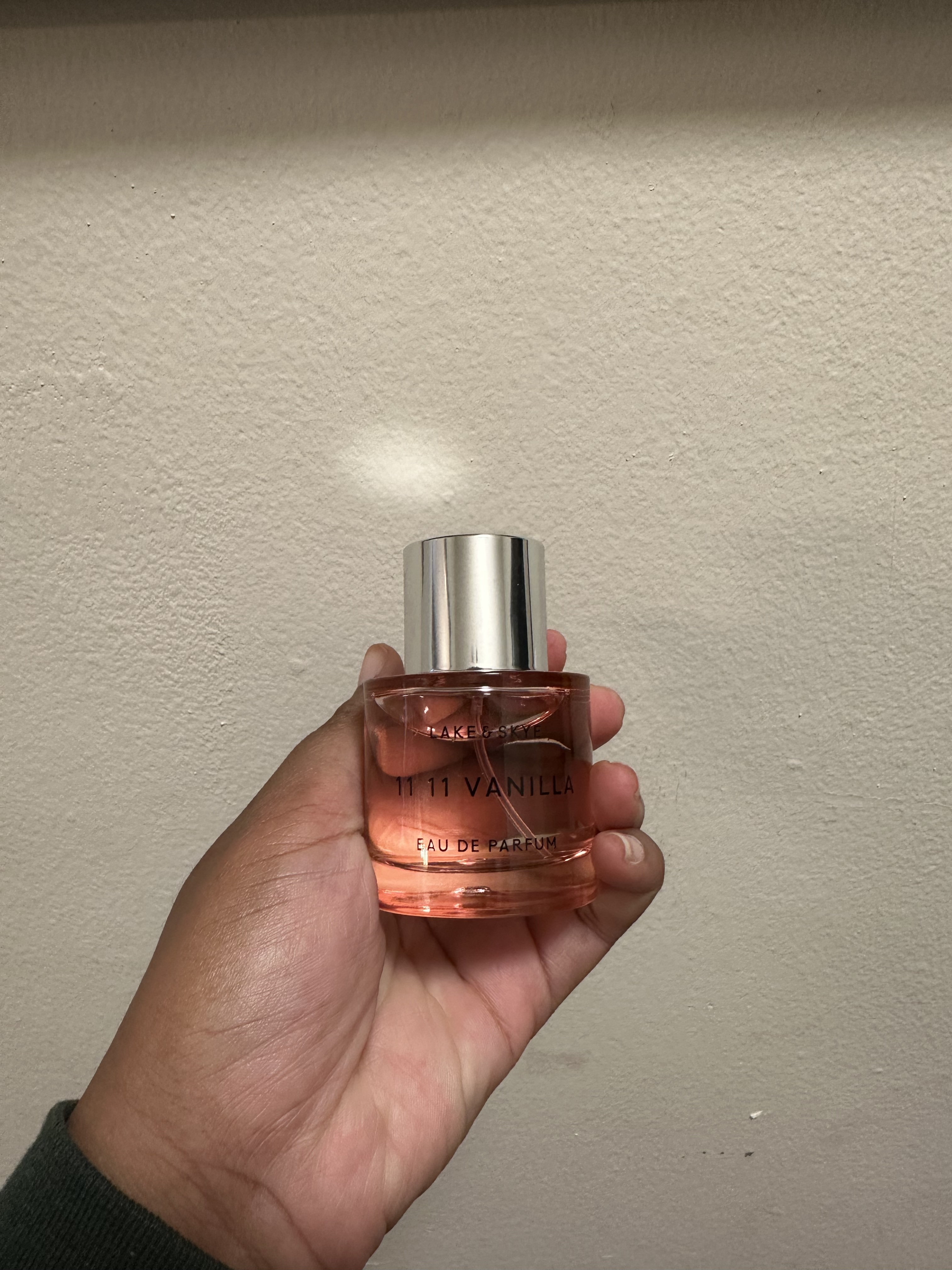 Ariel Baker testing 11 11 Vanilla Sky perfume.
