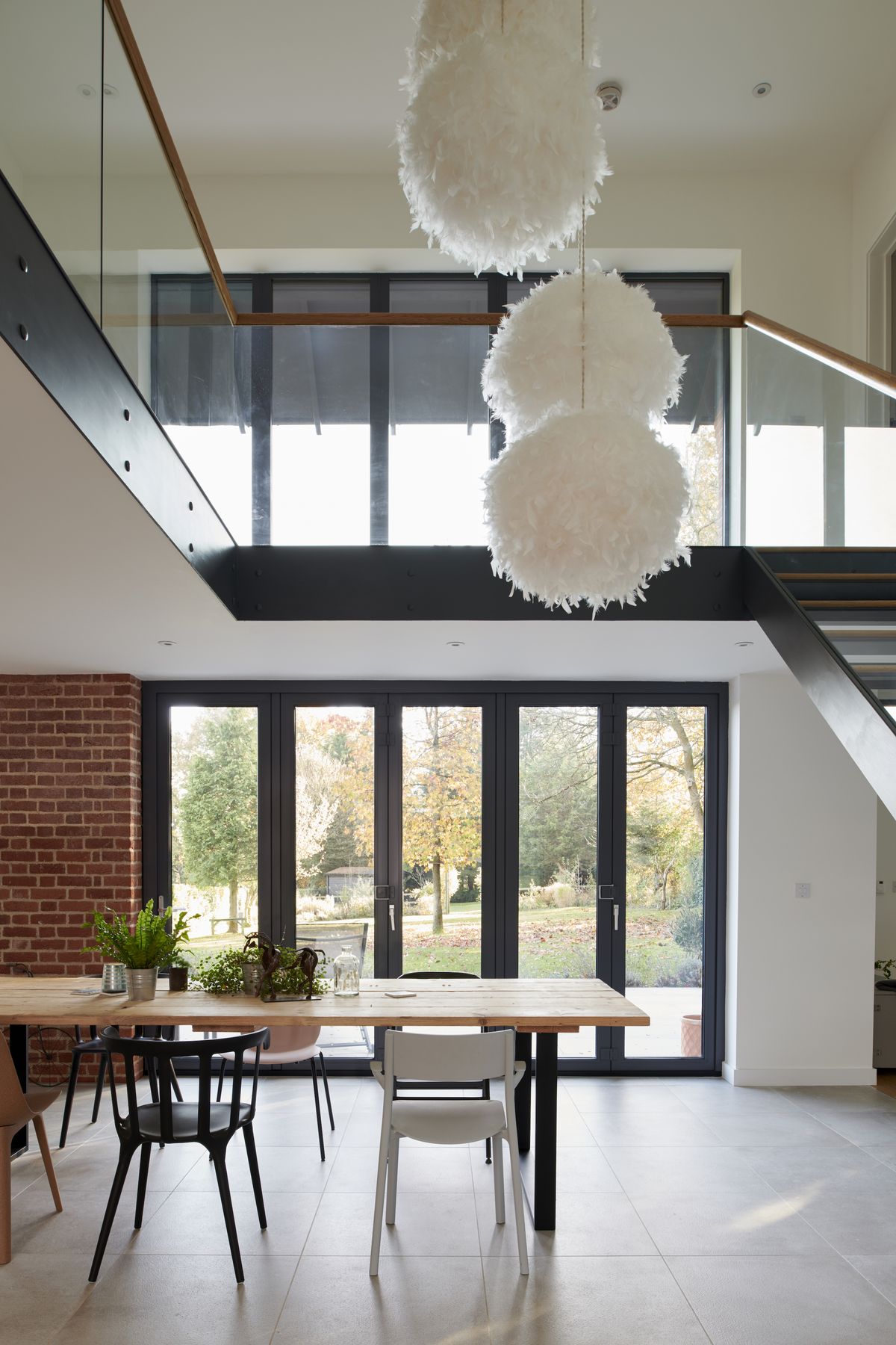 The show-stopping pendant light was made by Alan using separate rose, long cord and shade components.