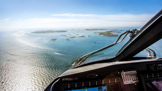 A view from inside a Penzance Helicopter craft as it flies into the Isles of Scilly