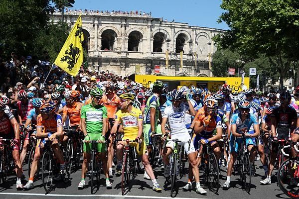 The riders line up for the start