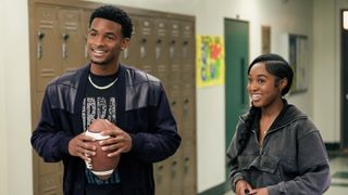 Nathaniel Logan McIntyre as KJ and Alexis Chikaeze as Amina smiling in All American season 7 episode 1