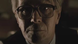 Gary Oldman looking dour while telling a story in Tinker Tailor Soldier Spy.