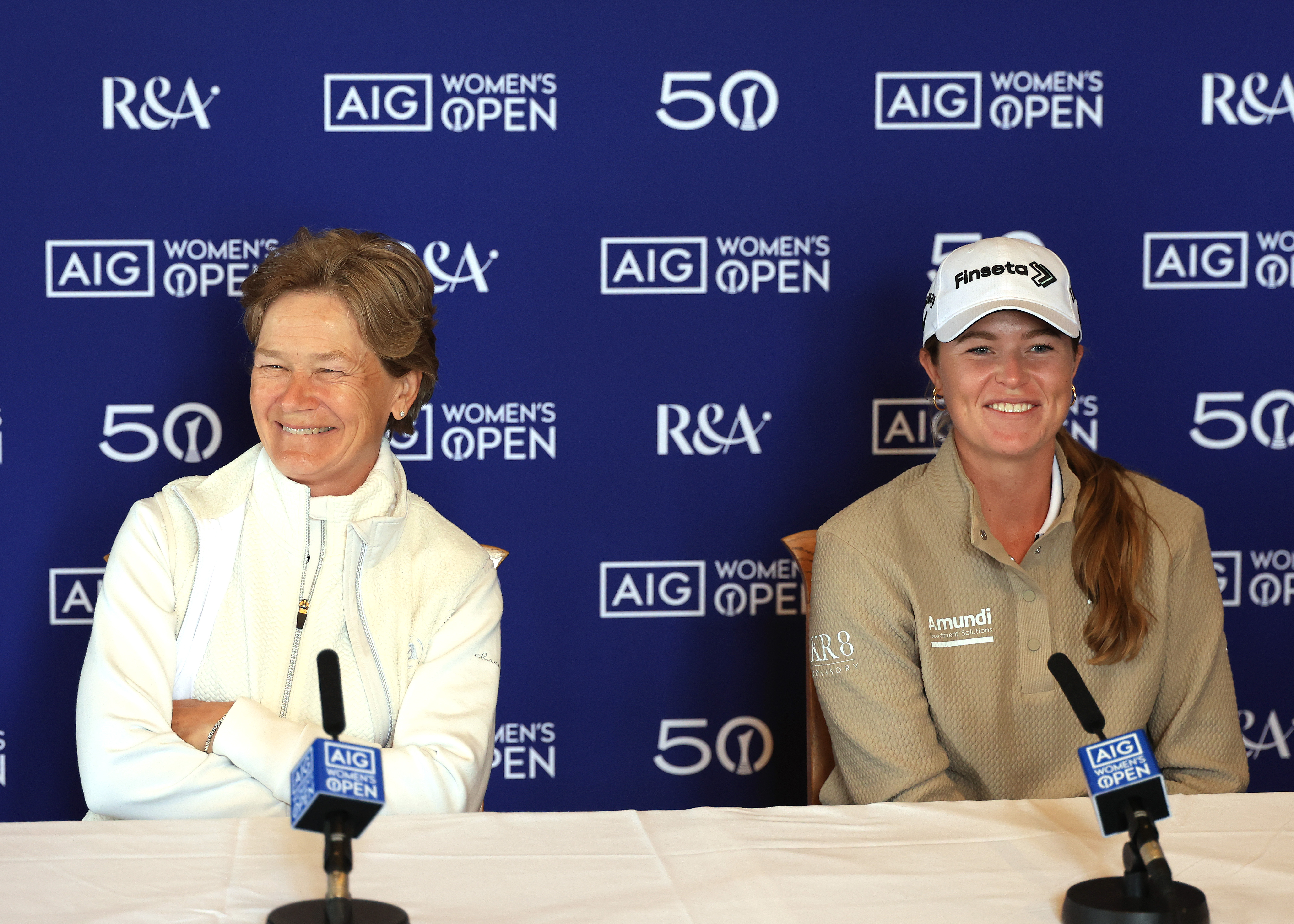 (left) Catriona Matthew and Mimi Rhodes smile during a press conference at Royal Lytham and St Annes to promote the 2026 AIG Women's Open