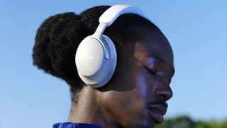 Bose QuietComfort Ultra Headphones on the head of a man