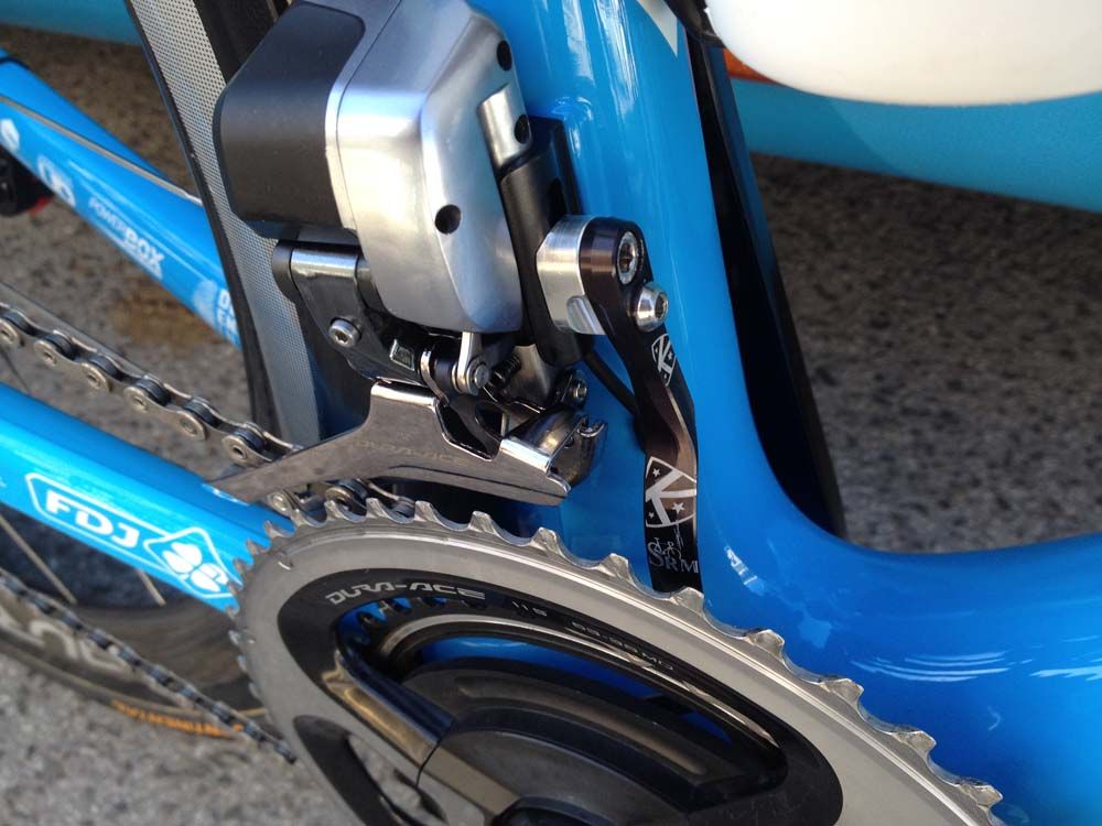 A Shimano Dura Ace Di2 front shifter and SRM chain catcher looks after the chain rings