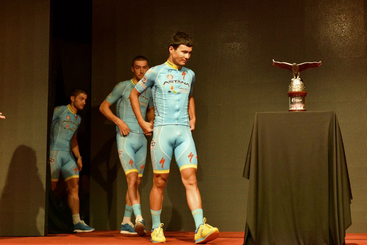 Astana are led out onto the stage
