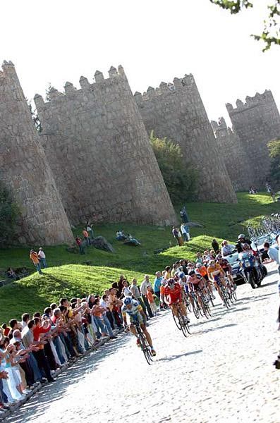 The second group fights to get through the cobbled circuit