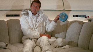 Roger Moore shows off some caviar on the couch in A View to a Kill.