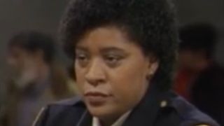 roz staring down on night court.