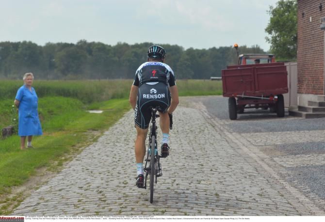 A solitary fan watches Tony Martin ride by