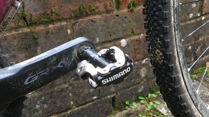 Image shows the Shimano PD-M520 pedals mounted on a bike