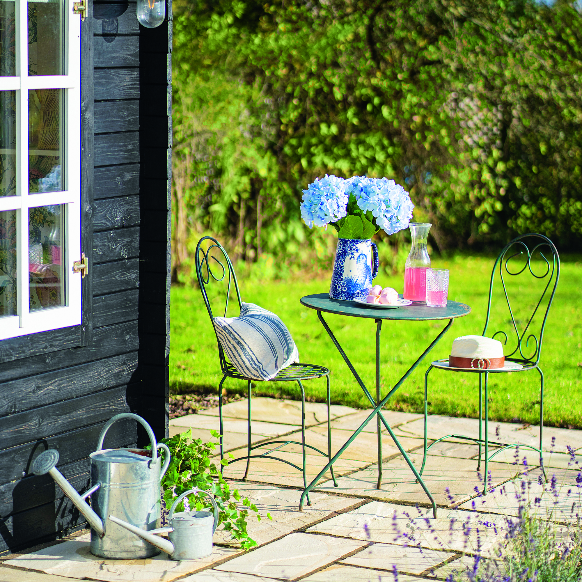 Bistro table on patio in the garden