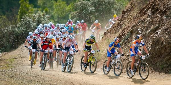 The men speed through the start loop
