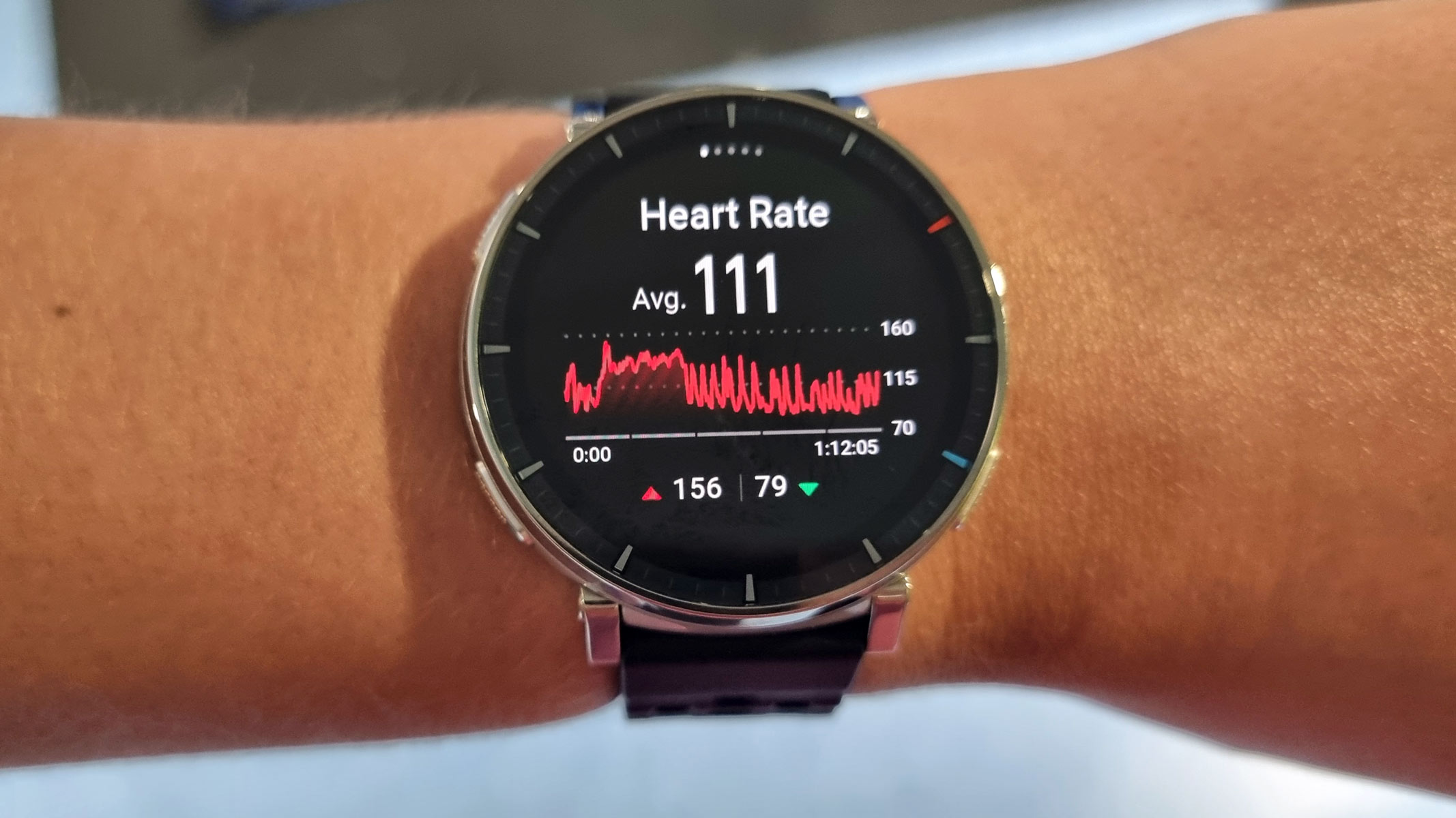 a close-up picture of our reviewer testing the Amazfit Active 3 Premium smartwatch during a workout