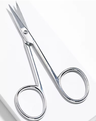 Tweezerman Stainless Steel Nail Scissors on white box over white background