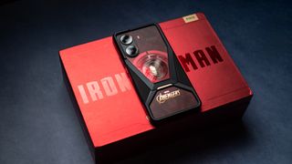 POCO X7 Pro Iron Man Edition back view next to comic