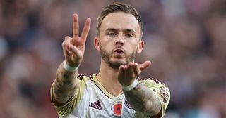 Manchester United target James Maddison of Leicester City holds up two fingers and blows a kiss as he celebrates scoring the opening goal during the Premier League match between West Ham United and Leicester City at London Stadium on November 12, 2022 in London, United Kingdom.