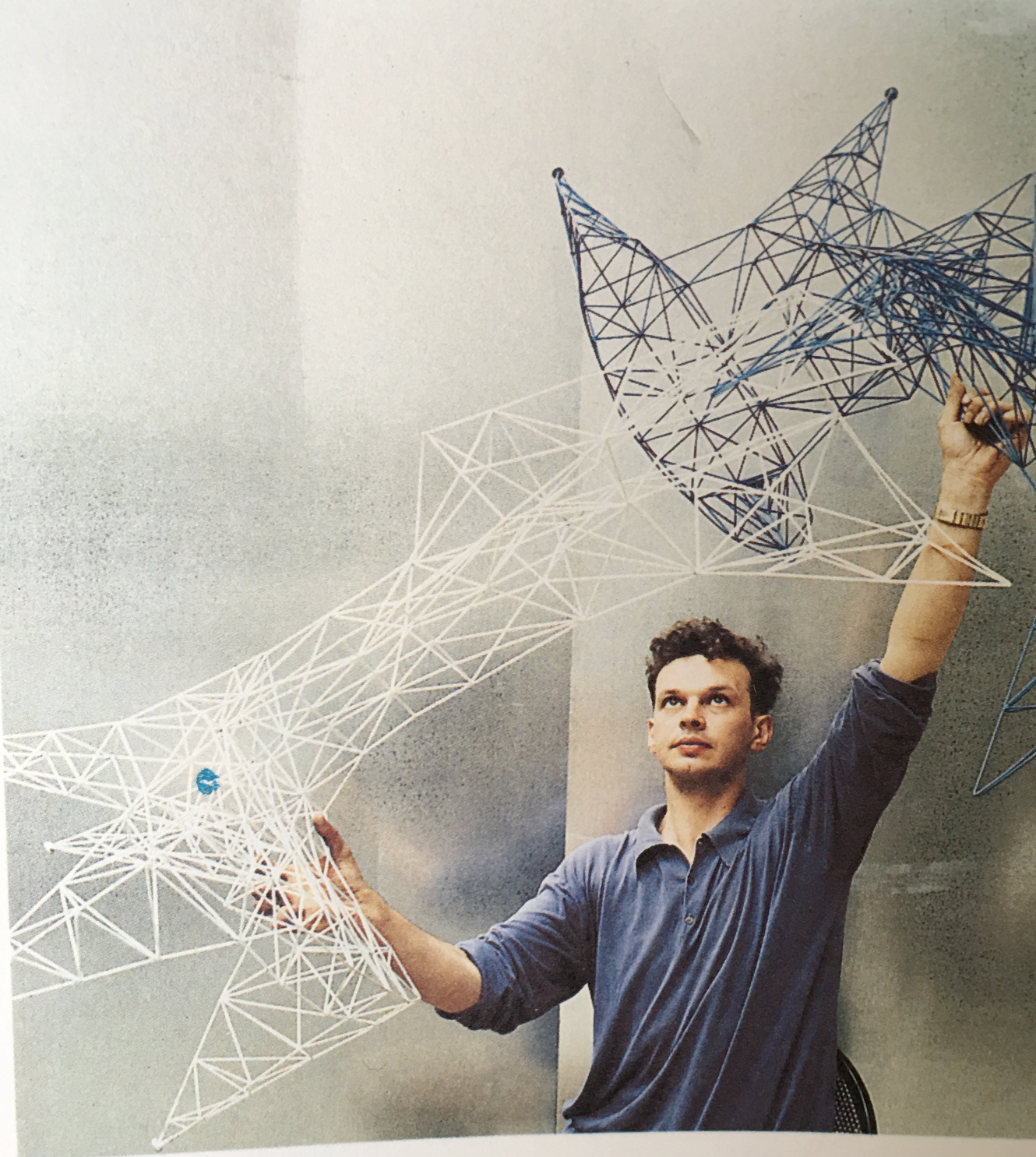 Tom Dixon as a young man with metal furniture he made