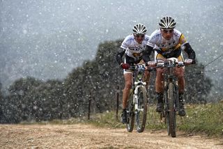 Manuel Beltran and Jose Luis Carrasco (Sport-Bike) on the way to winning stage 6 of the Andalucia Bike Race. It was snowing up in the Jaén mountains.