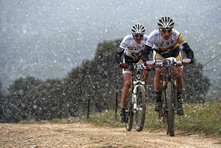 Manuel Beltran and Jose Luis Carrasco (Sport-Bike) on the way to winning stage 6 of the Andalucia Bike Race. It was snowing up in the Ja&eacute;n mountains.