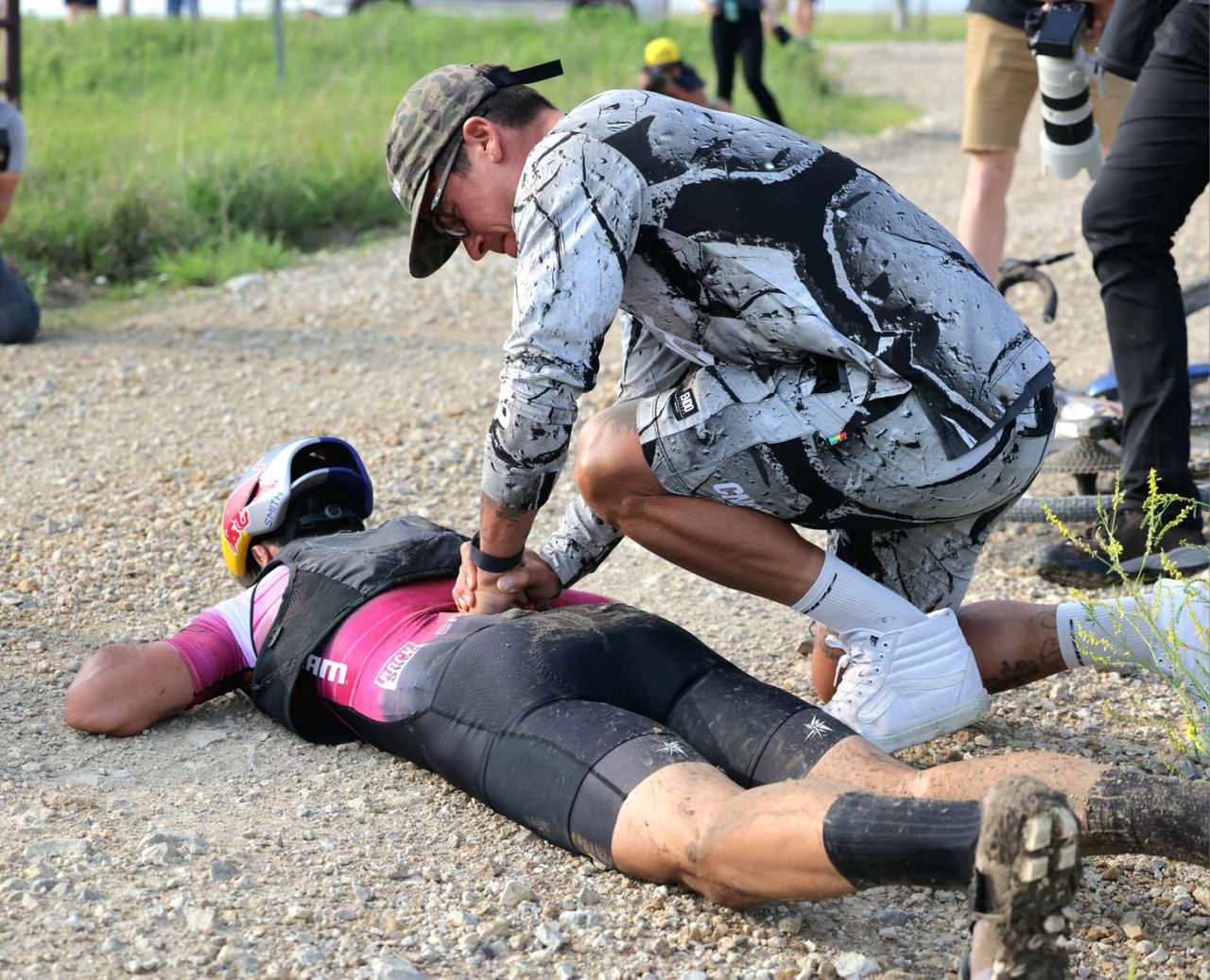 Payson McElveen gets assistance for his back at 2023 Unbound Gravel 200