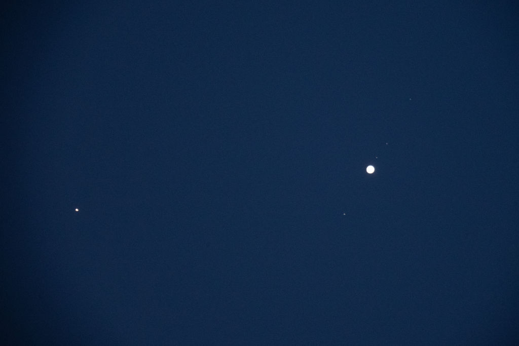 jupiter is the bright dot on the right and mars the bright small dot to the left.