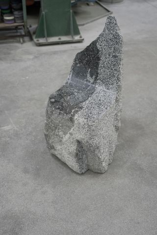 Stone chair made from a single Tonalite granite boulder
