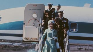 Queen Elizabeth II, the Duke of Edinburgh, Prince Charles and Princess Anne disembark from an Air New Zealand aircraft during their visit to New Zealand, March 1970. They are there in connection with the bicentenary of Captain Cook's 1770 expedition to Australia.