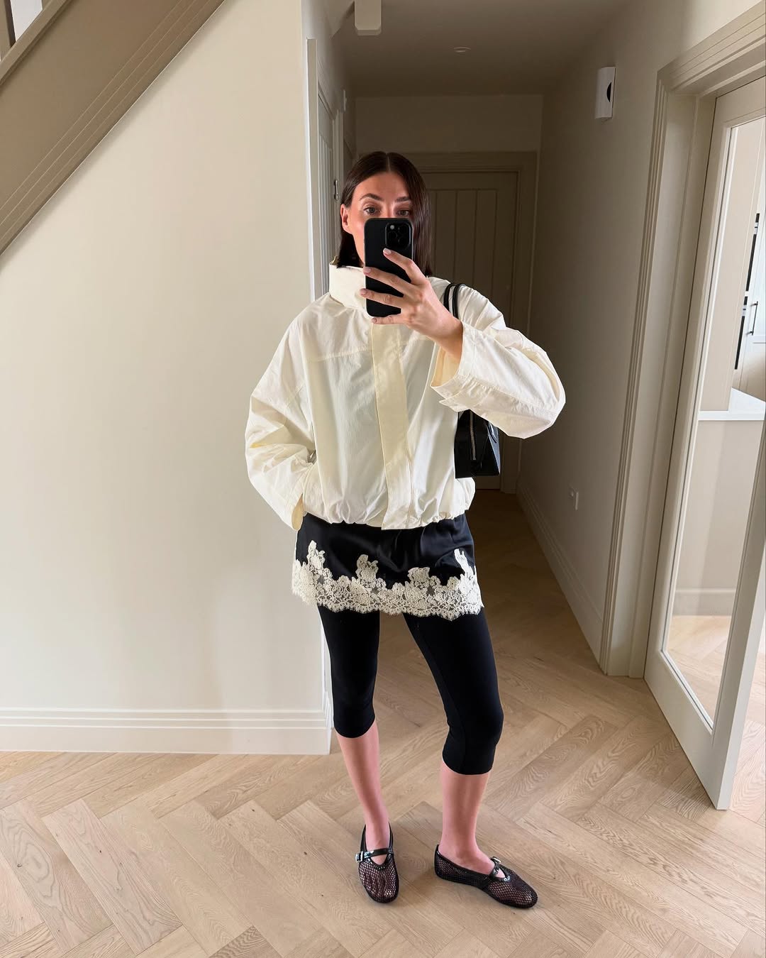 woman wearing winter to spring transitional pant trend 2026