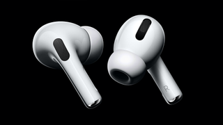 A pair of Apple AirPods Pro next to each other.
