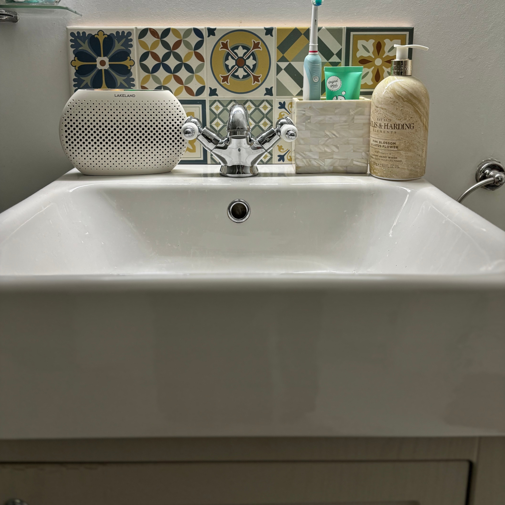 lakeland small dehumidifier on a sink in a bathroom