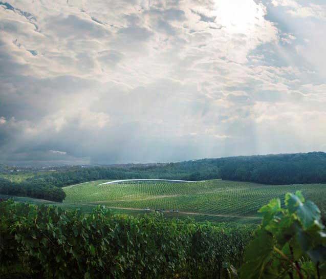 A view across the Kent vineyard landscape with an impression of a proposed new winery designed by Foster and Partners.