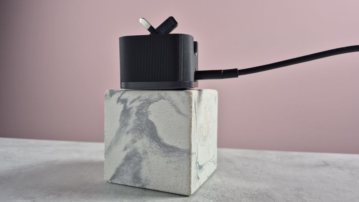 Anker Nano Charger 45W with USB-C Cable on block with prongs semi-folded