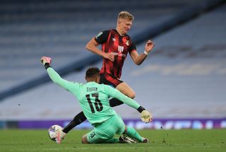 City goalkeeper Zack Steffen makes a save from Sam Surridge