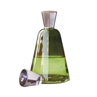 A purple and green glass decanter 