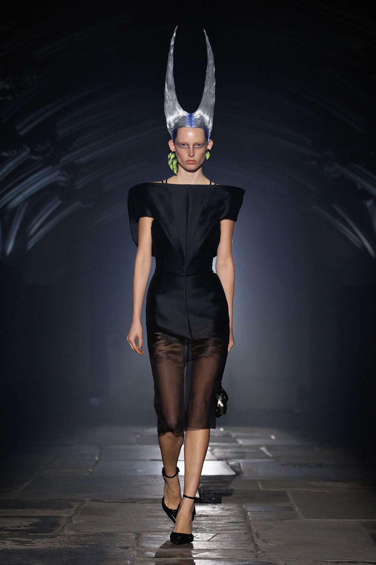 Photo of model walking in the Alexander McQueen Spring Summer 2027 show.