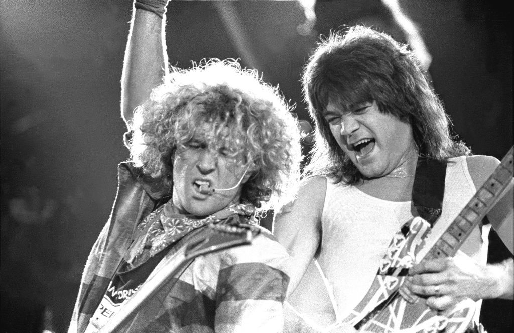 Guitarist Eddie Van Halen and Sammy Hagar are shown performing on stage during a &quot;live&quot; concert appearance with Van Halen on August 26, 1986. (Photo by John Atashian/Getty Images)